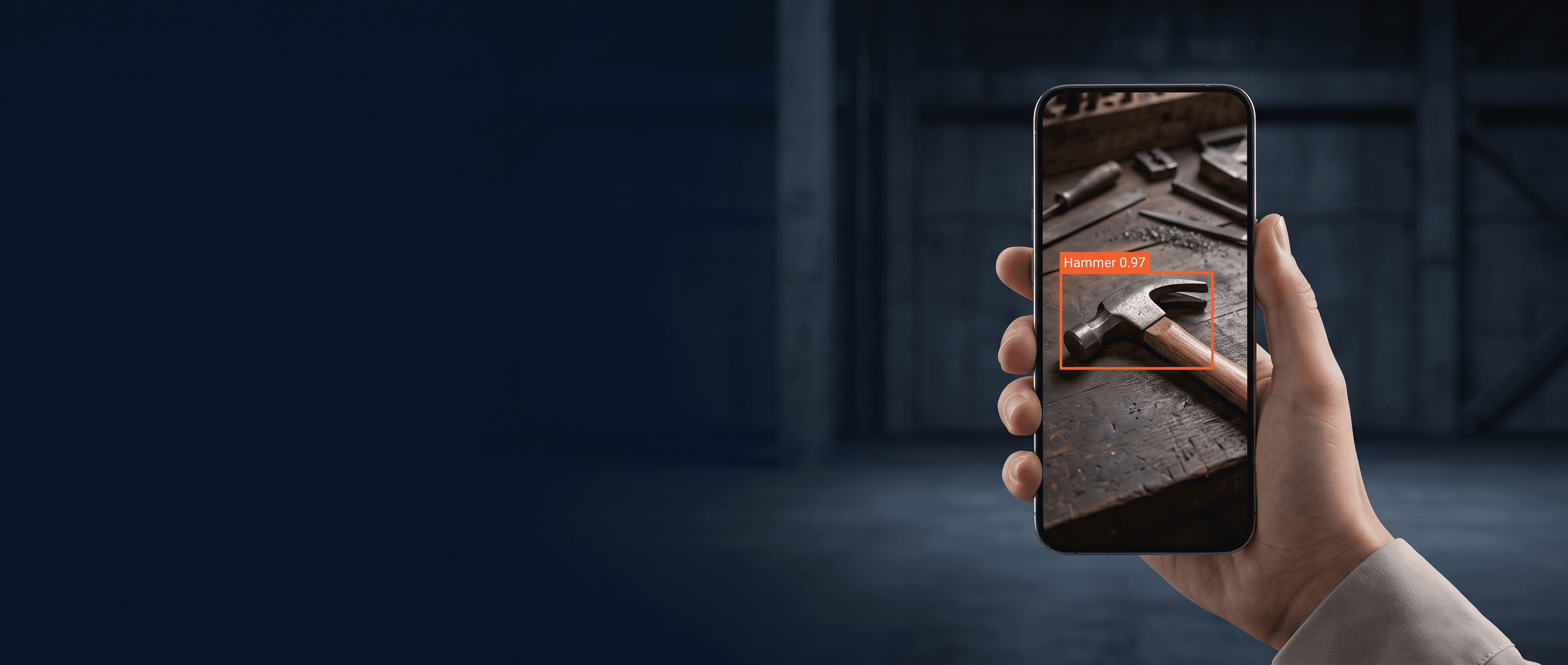 A phone camera identifying a hammer on a workshop bench — no tags, no scanning.
